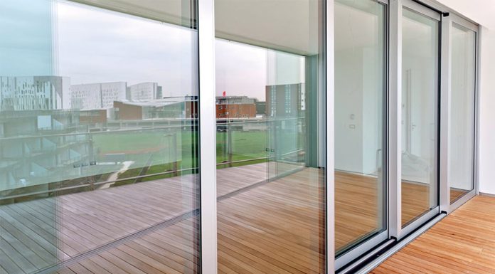 Где заказать недорого раздвижное остекление?